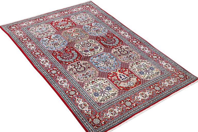 A Quum carpet, c. 250 x 150 cm.