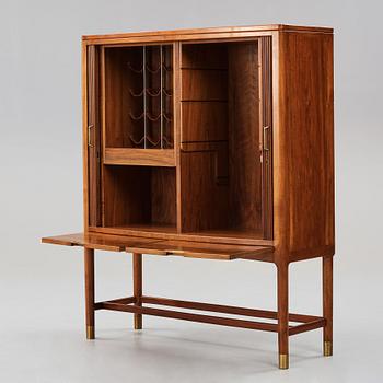 HANS J WEGNER, a bar cabinet executed by cabinetmaker Axel I Sørensen, for the Mayor's office, Aarhus City Hall,  1941.