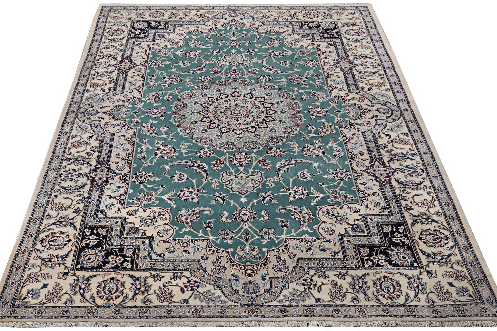 A Nain carpet, part silk, 6 laa, ca. 300 x 201 cm.