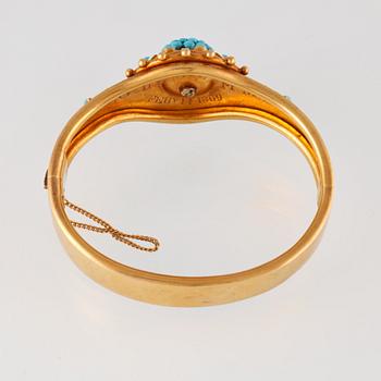 ARMBAND, 14K guld med turkoser och vit emalj. Vikt 28,8 gram.