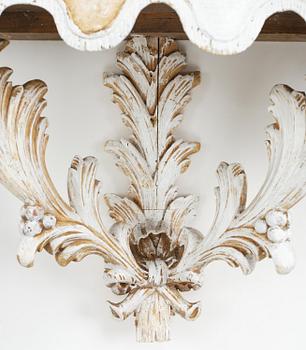 A pair of French Louis XVI-style consoles, late 19th century.