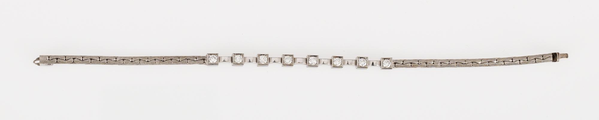 ARMBAND, 8 briljantslipade diamanter, tot. 0.80 cts.