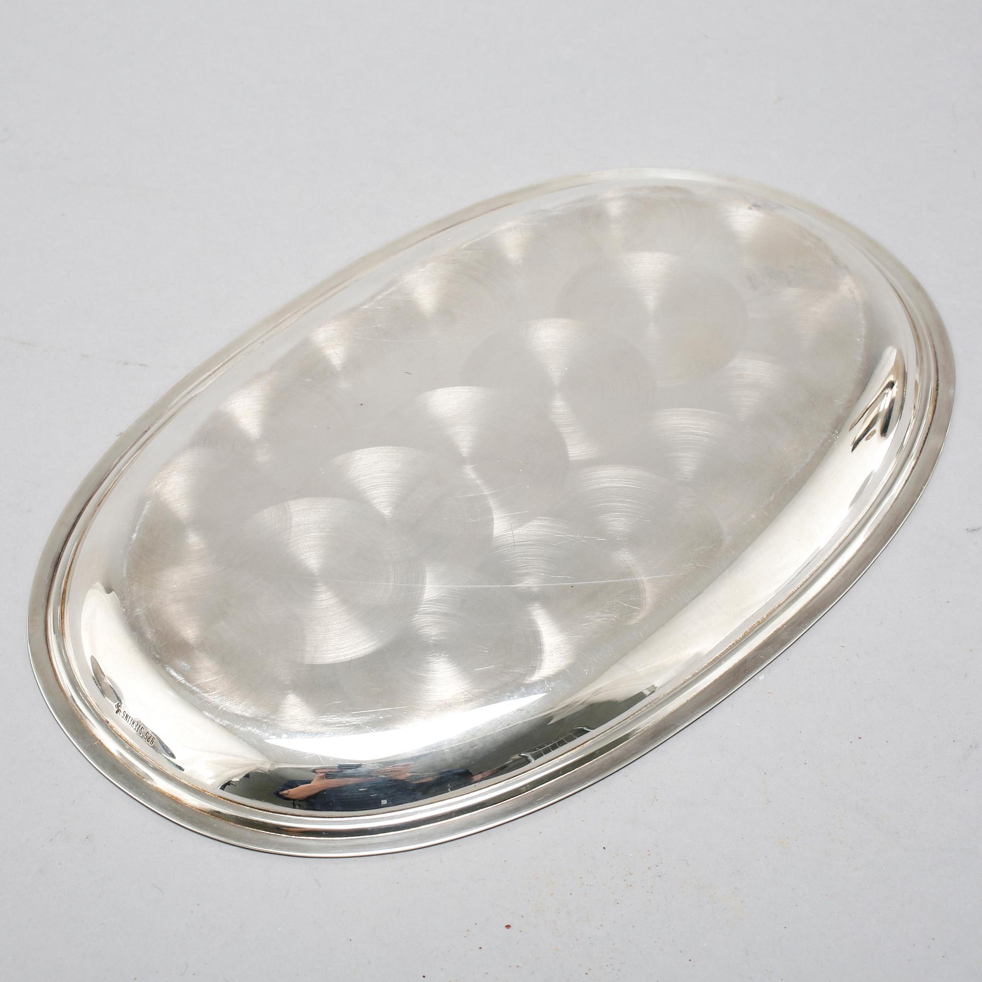 A silver coffee set of four pieces from the middle of the 20th century.
