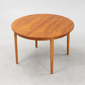 A teak-veneered dining table, second half of the 20th century.