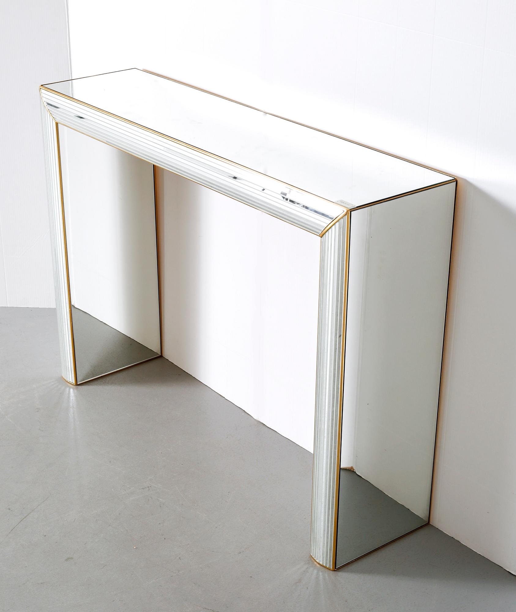 A late 20th century mirror and console table by Deknudt, Belgium.