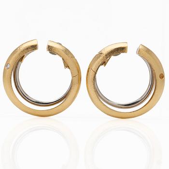 Ole Lynggaard, 18K gold and diamond hoop earrings.