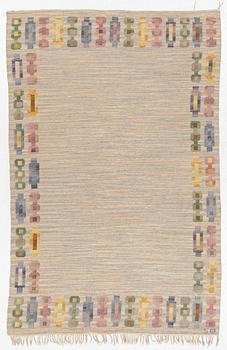 A flat weave carpet, c. 300 x 200 cm, signed SW.