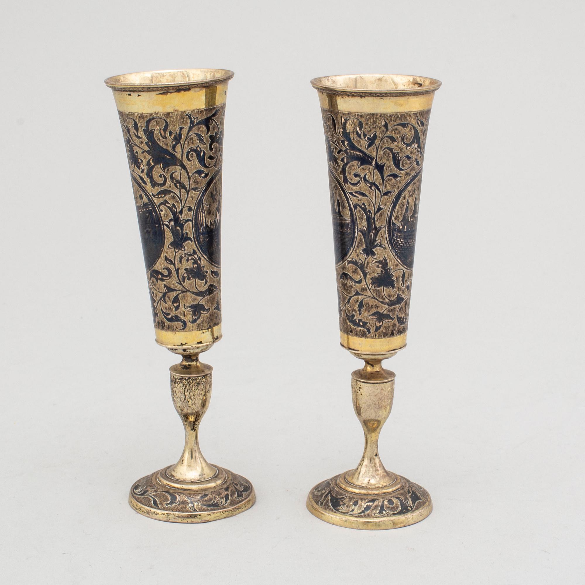 Two similar silver-gilt champagne flutes, unidentified makers mark, Moscow 1843.