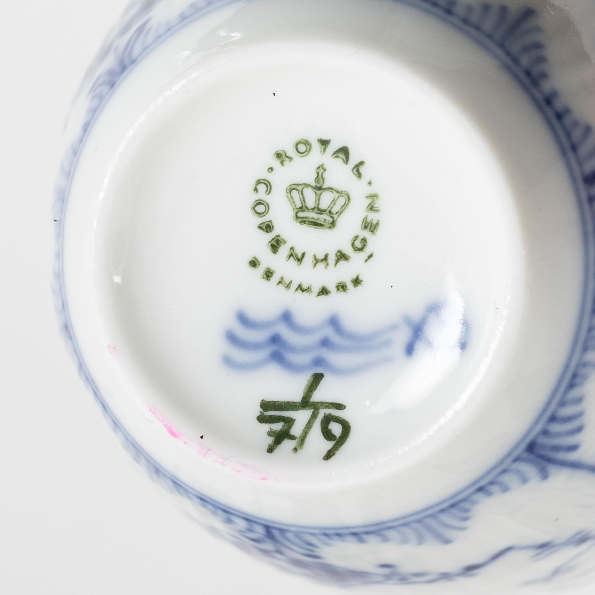 A 56 piece dinner and coffee service, half lace 'Musselmalet', Royal copenhagen, Denmark.
