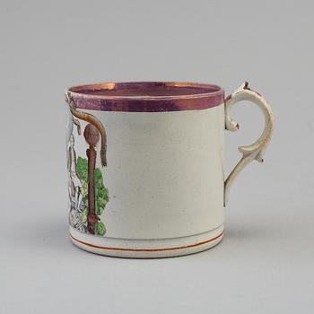 AM ENGLISH CREAMWARE MASONIC MUG, first half of the 19th century.