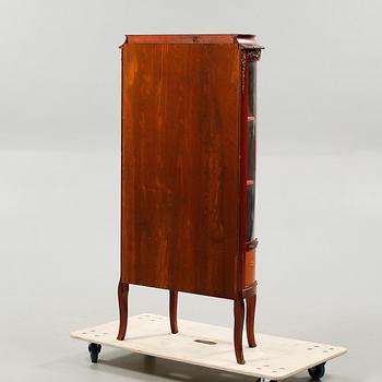 A mid 20th century glass cabinet.