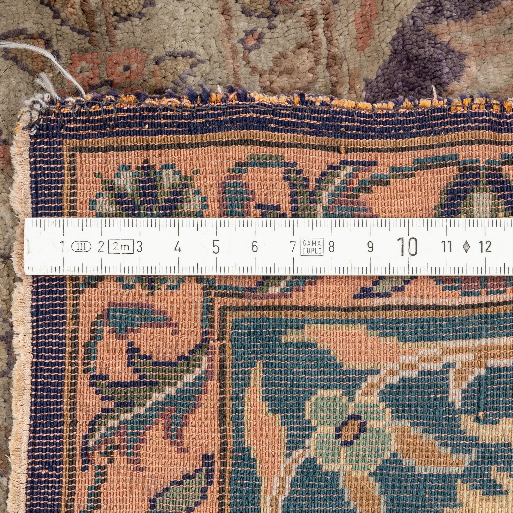 A Turkish rug, c. 185 x 125 cm.