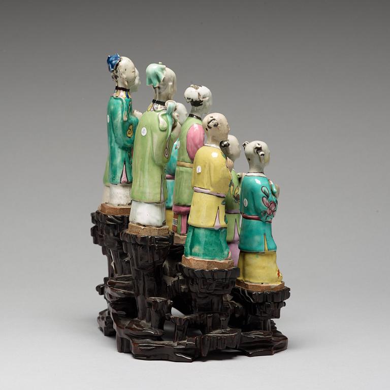 A group of eight famille rose figurines, Qing dynasty, 19th Century.