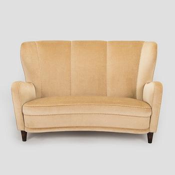 A mid-20th century sofa.