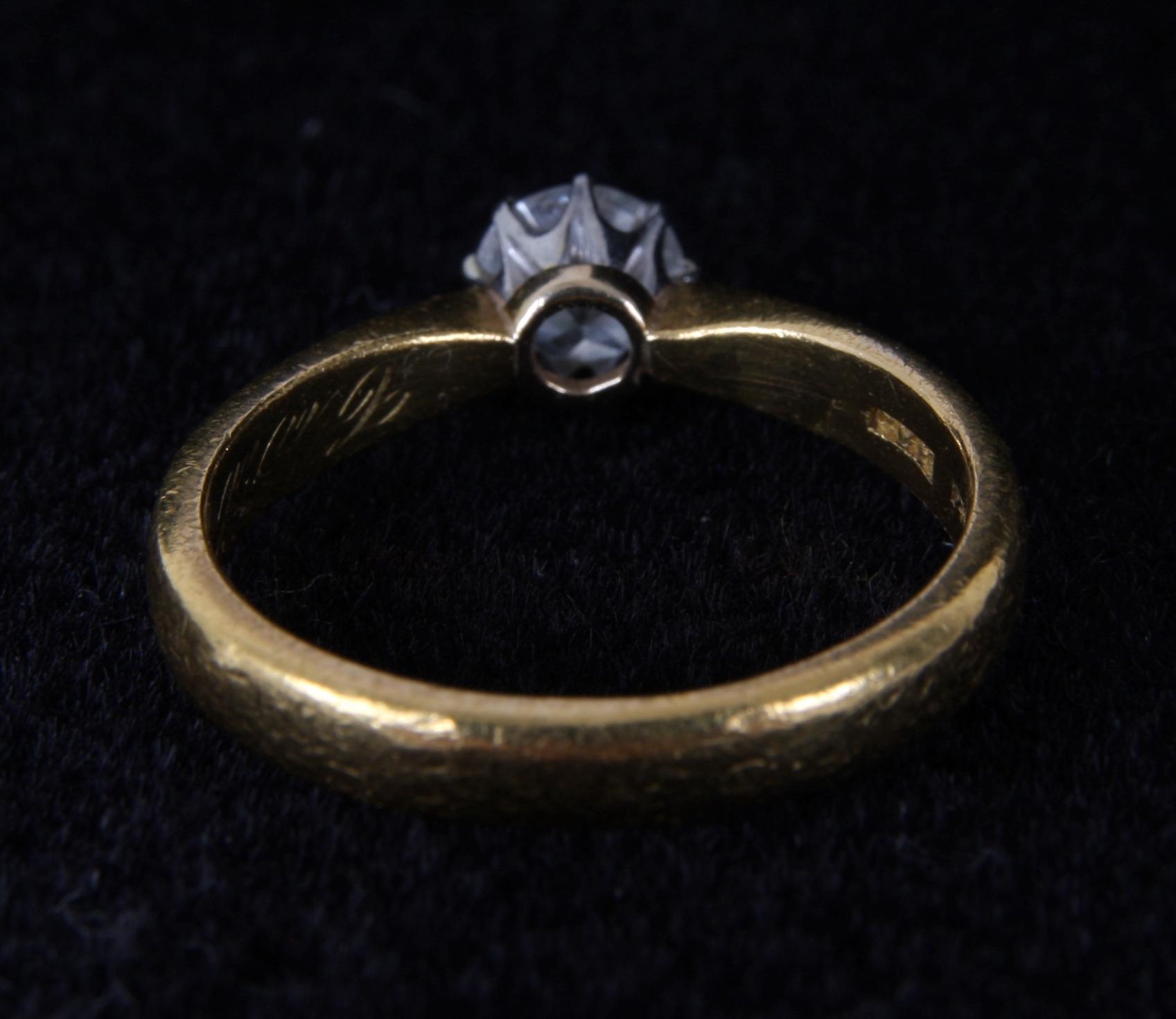 RING, 23K guld med briljant ca 0,25ct.