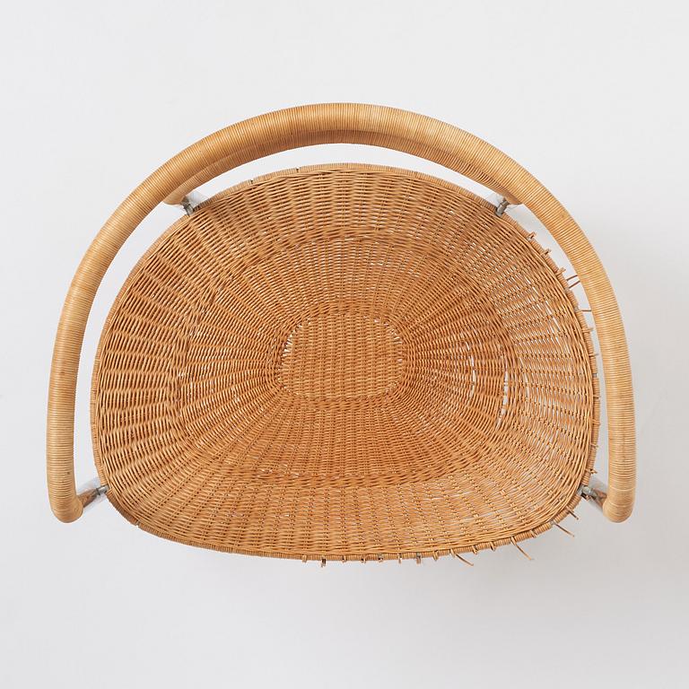 Poul Kjaerholm, a steel and rattan 'PK12' chair, E Kold Christensen, Denmark, early 1960s.