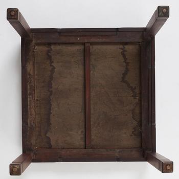 A Chinese hardwood corner-leg table, Qing dynasty.