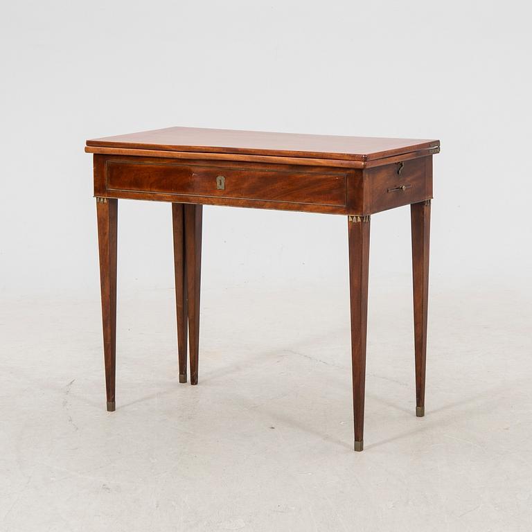 A late Gustavian mahogany game table first half of the 19th century.