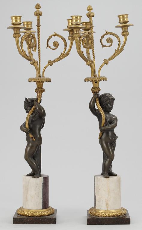 A pair of French 19th century three-light candelabra.