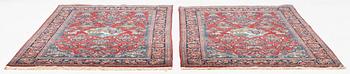 A pair of semi-antique pictoral Kashan rugs, ca 200 x 130 and 197 x 128 cm.