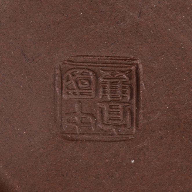 A group of three yixing pots, 20th century.