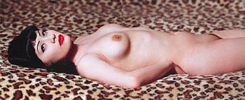 104. Albert Watson, "Breaunna on Leopard Print Bedspread, Las Vegas Hilton, 2001".