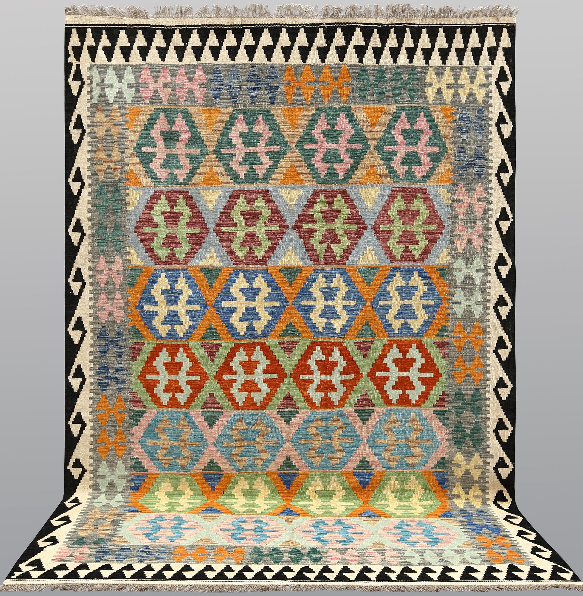 A kilim carpet, ca 290 x 200 cm.