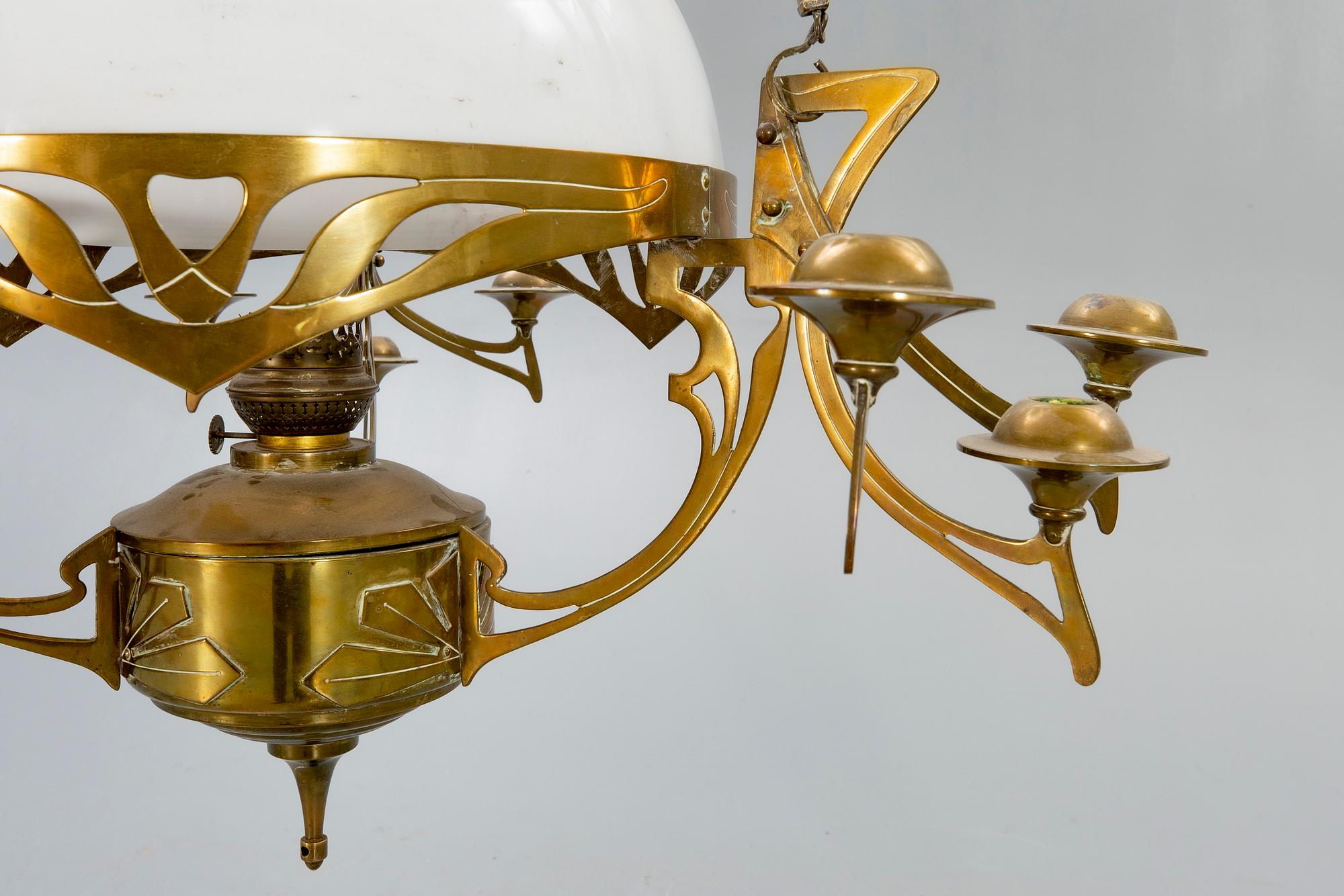 A Jugend brass celing paraffin lamp.