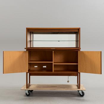 A second half of the 20th century teak veneered bar cabinet by Arne Wahl-Iversen, IKEA.