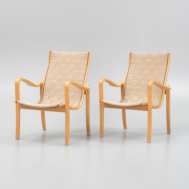 A pair of lounge chairs from Källemo.