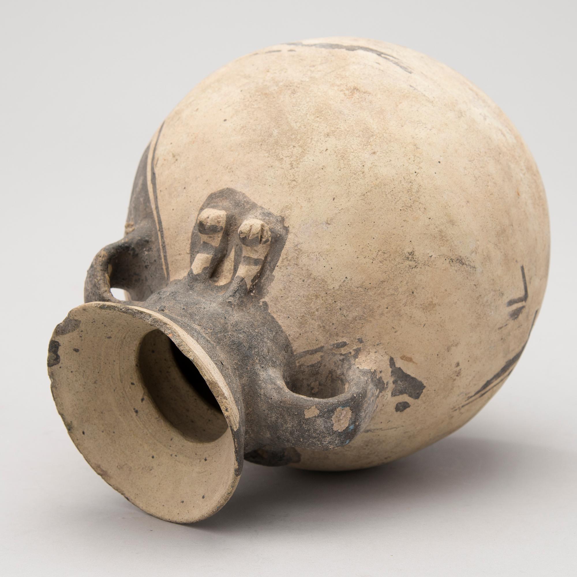 An earthenware 1200-1450 AD Central Peru pot. Chancay culture.