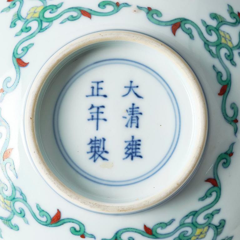 A doucai 'floral' bowl, Qing dynasty, Yongzheng mark and of the period (1723-35).