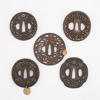 Five iron tsubas, China and Japan, 18/19th Century.