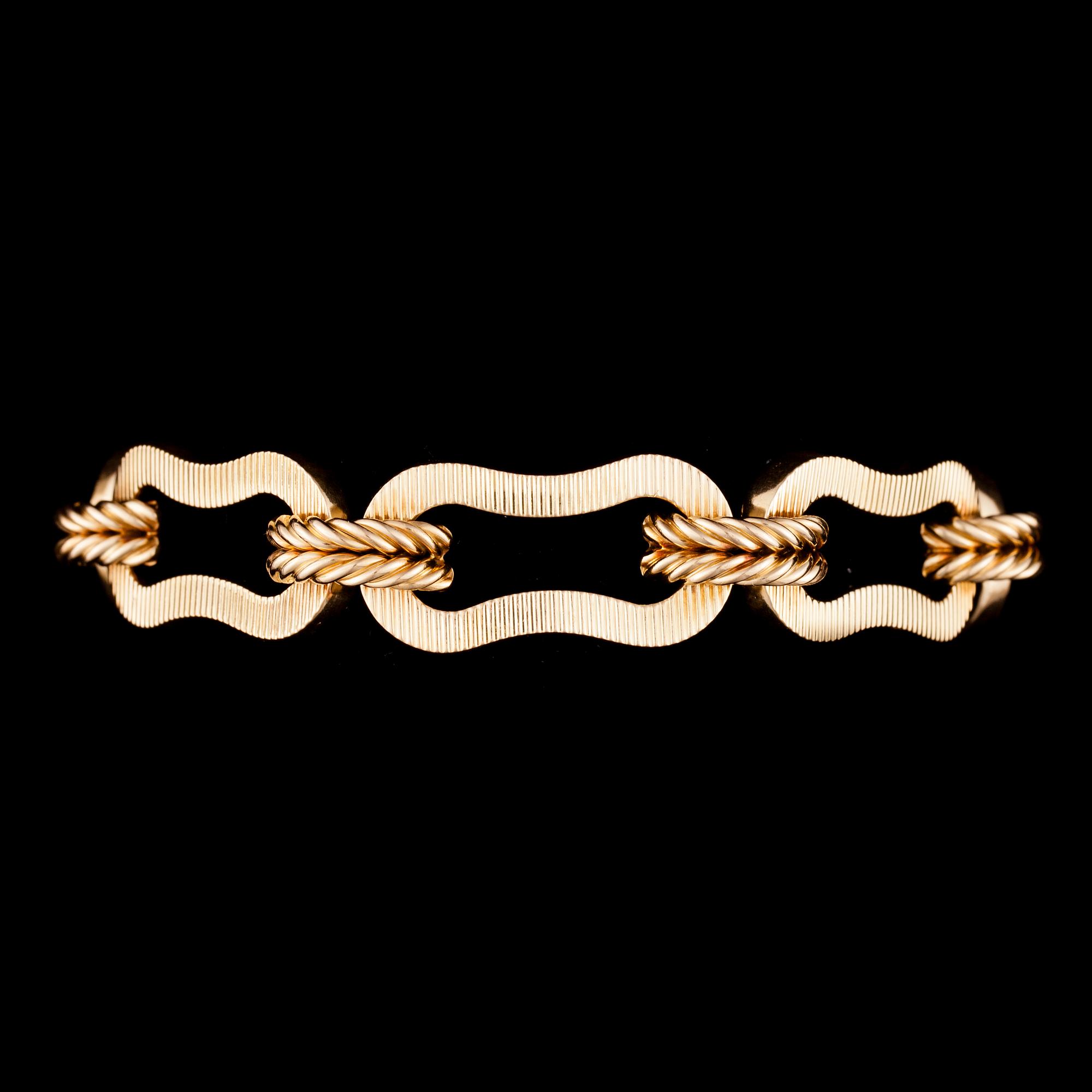 ARMBAND, 18K guld, italienska stämplar. Vikt 45,3 g.