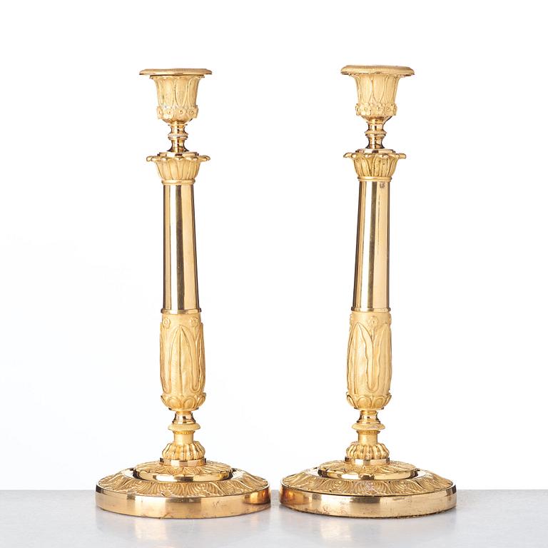 A pair of French Empire candlesticks, early 19th century.