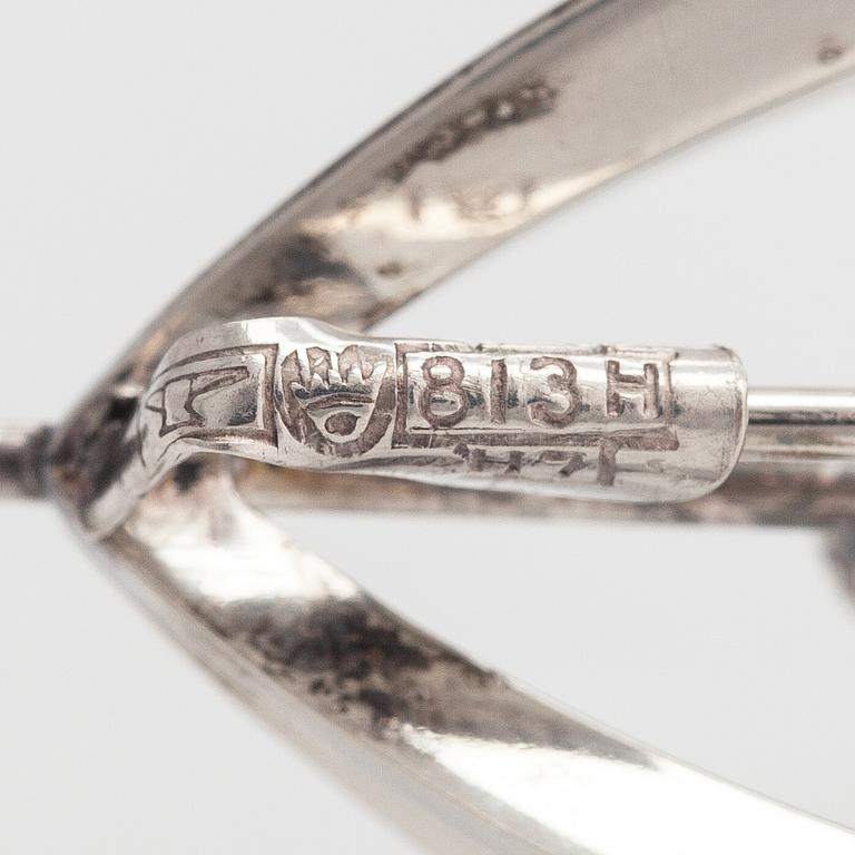 Elis Kauppi, A silver brooch/pendant with an amethyst. Kupittaan kulta, Turku 1961.