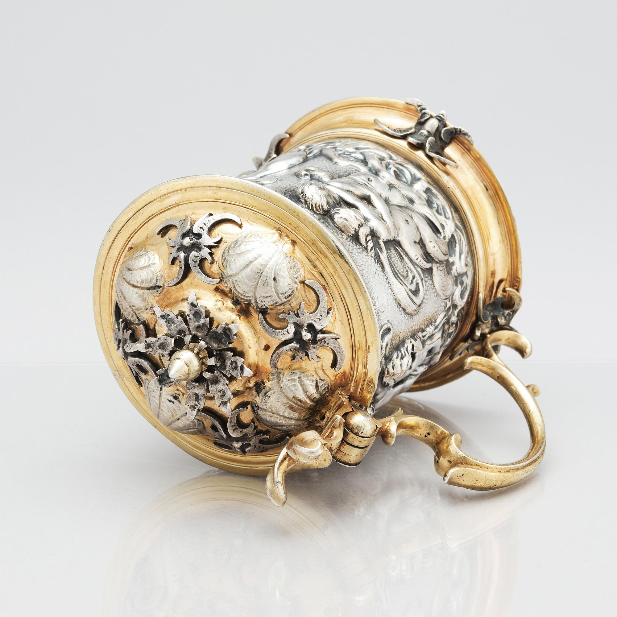 A German 17th century parcel-gilt silver tankard, mark of David Schwestermüller I, Augsburg 1634-1635.