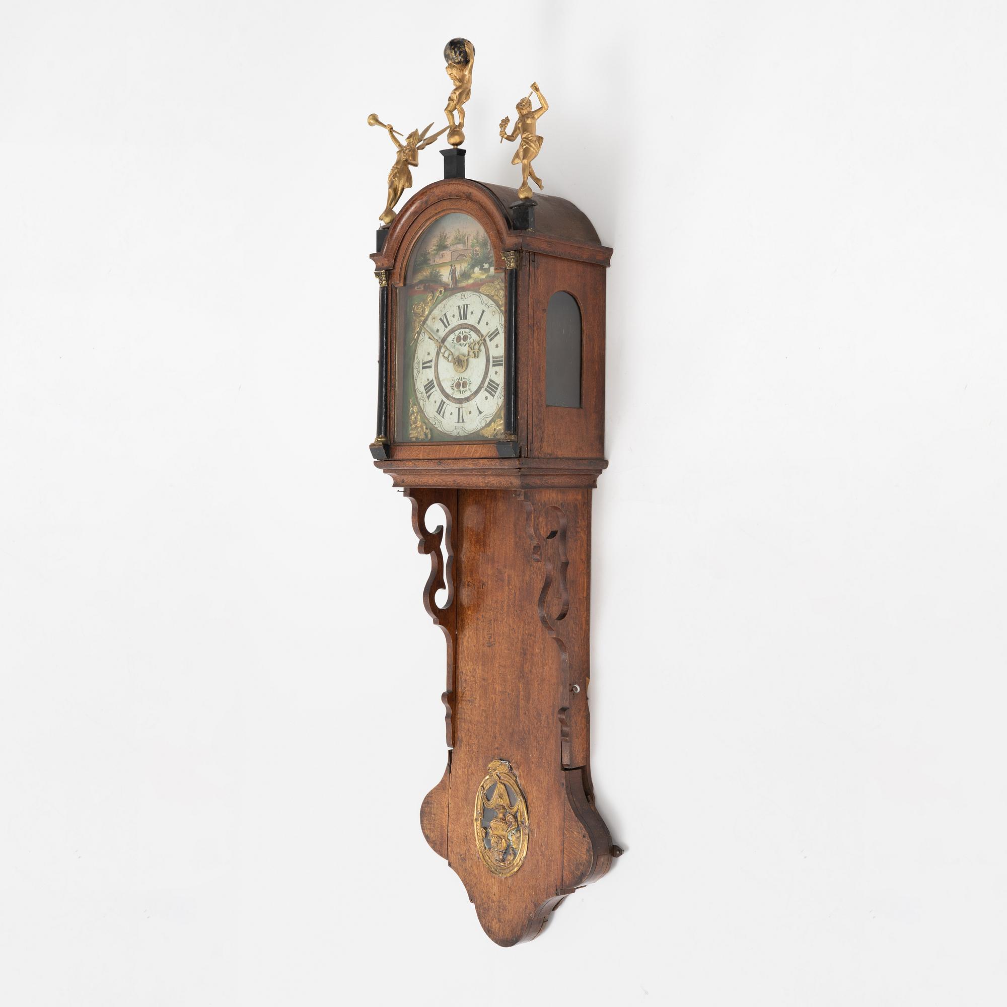 A Dutch wall clock, 18th/19th Century.