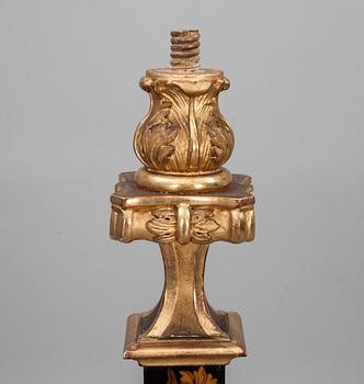 A pair of French Baroque circa 1700 candle stands.