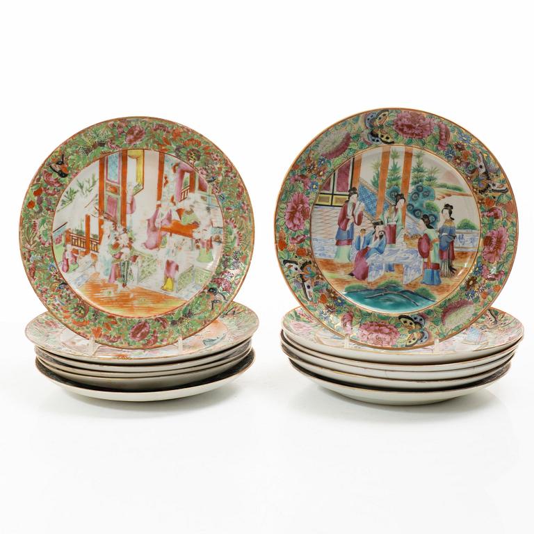 A matched set of 14 famille rose 'Canton' dinner plates, Qing dynasty, 19th century.