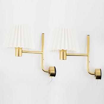 Hans-Agne Jakobsson, a pair of brass wall lights, Markaryd, second half of the 20th century.