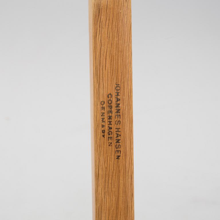 A model JH 575 coffee table by Hans J Wegner for Johannes Hansen.