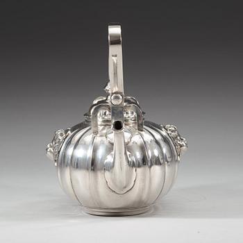 A Swedish 18th century silver tea-pot with two spouts, marks of Gustaf Stafhell d.ä., Stockholm 1740.