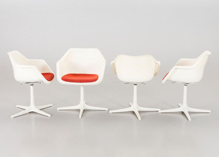 Six Robin Day armchairs.
