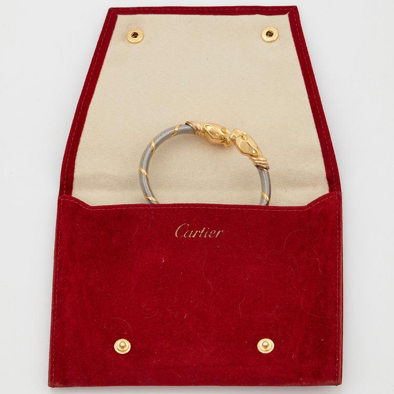 A Cartier "Panthère" bracelet in steel and 18K gold.