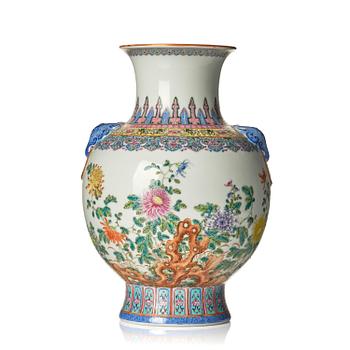 1074. A Chinese famille rose vase of archaistic Hu form, Republic period (1912-1949).