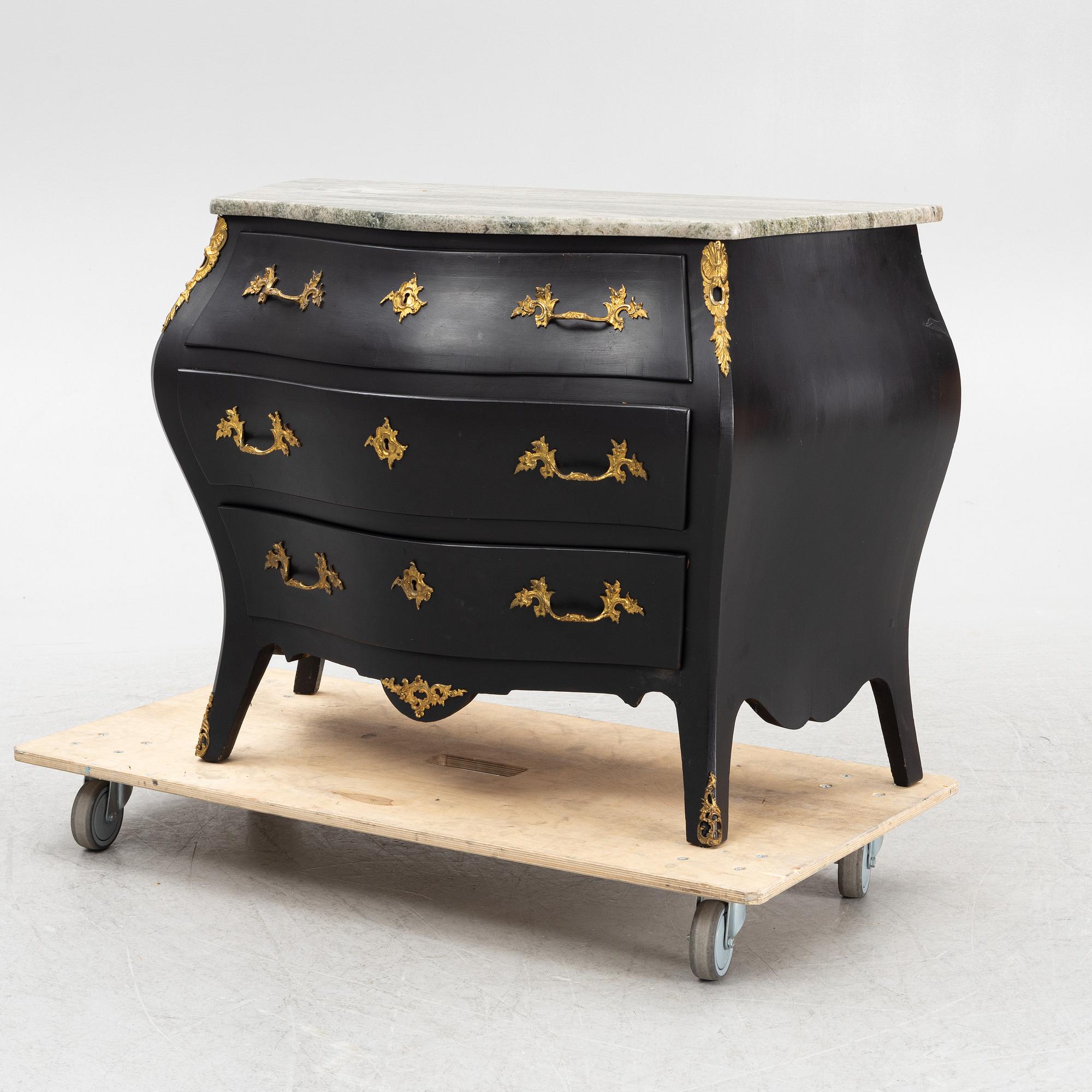 A Rococo style chest of drawers, mid 20th Century.
