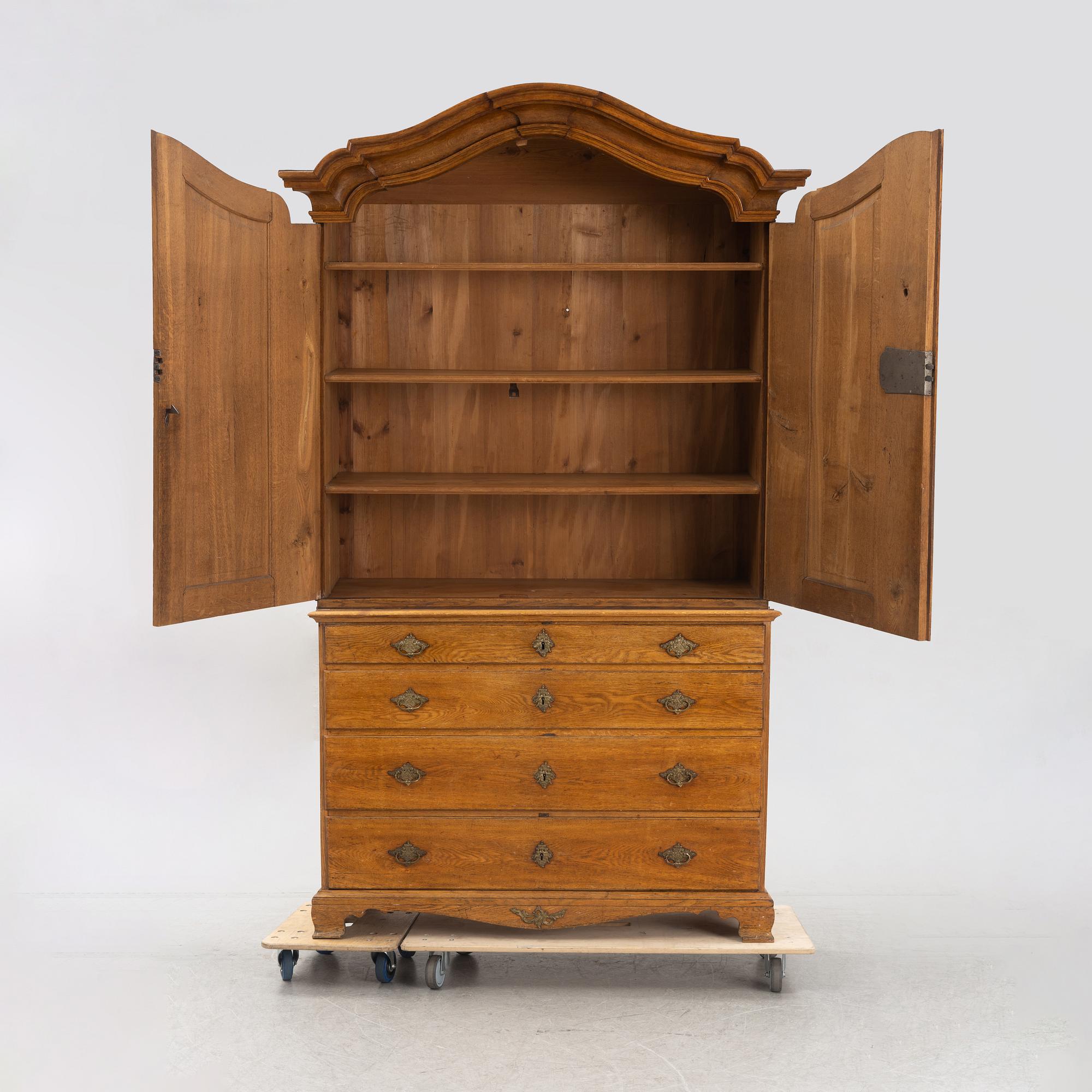 A Rococo cabinet, later part of the 18th Century.