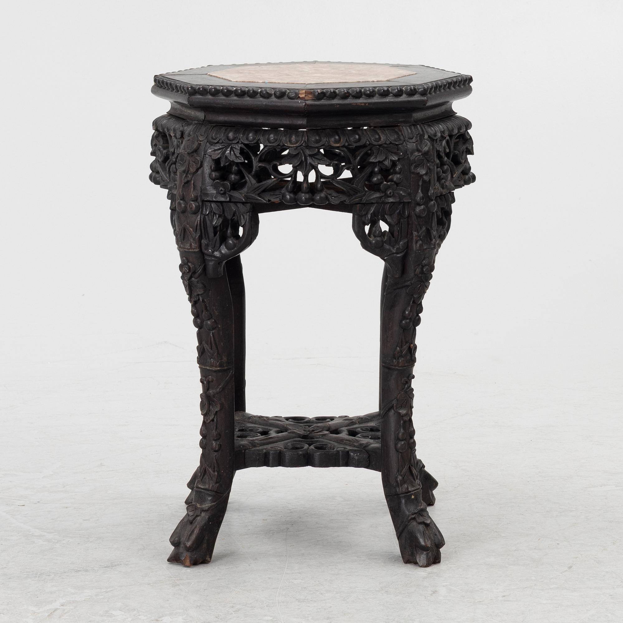 A Chinese small table, carved wood and stone, 1900s.