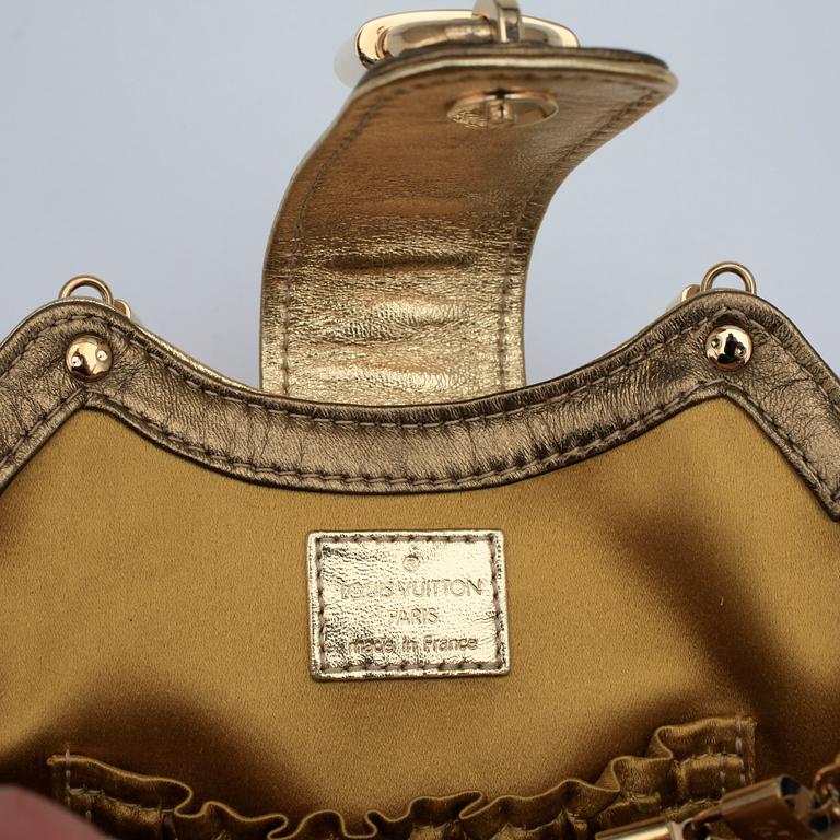 LOUIS VUITTON, a bronze coloured monogram leather handbag.